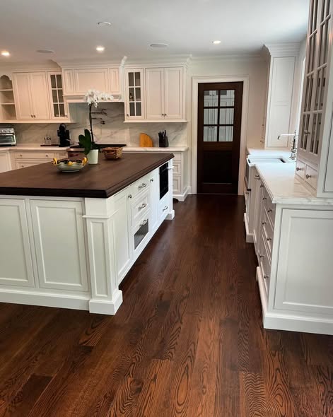 Classic White Inset Kitchen Cabinetry with Dark Wood Island Top
