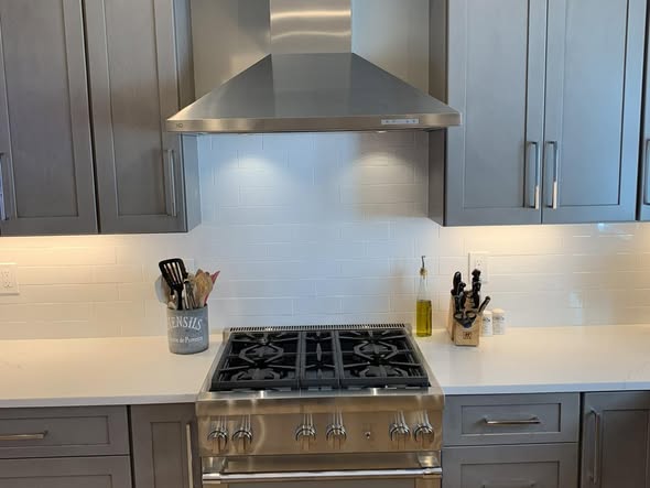 Contemporary Charcoal Gray Kitchen Cabinetry with White Quartz