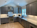 Contemporary Charcoal Gray Kitchen Cabinetry with White Quartz