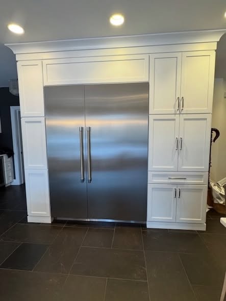 Mixed-Tone Kitchen Cabinetry with Built-In Appliances &amp; Marble Counters
