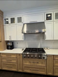 Mixed-Tone Kitchen Cabinetry with Built-In Appliances & Marble Counters