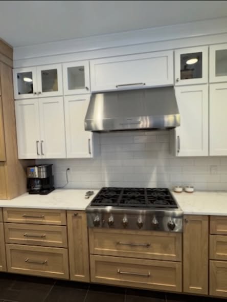 Mixed-Tone Kitchen Cabinetry with Built-In Appliances &amp; Marble Counters