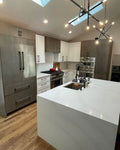 Modern Three-Tone Kitchen Cabinetry with Casual Bar Island