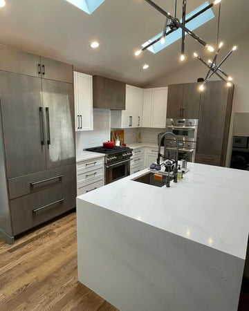 Modern Three-Tone Kitchen Cabinetry with Casual Bar Island