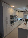 Modern Two-Tone Kitchen Cabinetry with Charcoal Gray Island