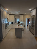 Modern Two-Tone Kitchen Cabinetry with Charcoal Gray Island