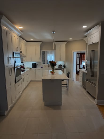 Modern Two-Tone Kitchen Cabinetry with Charcoal Gray Island