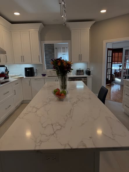 Modern Two-Tone Kitchen Cabinetry with Charcoal Gray Island