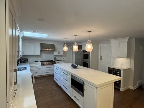 Premium All-White Kitchen Cabinetry with Large Island