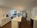 Premium All-White Kitchen Cabinetry with Large Island