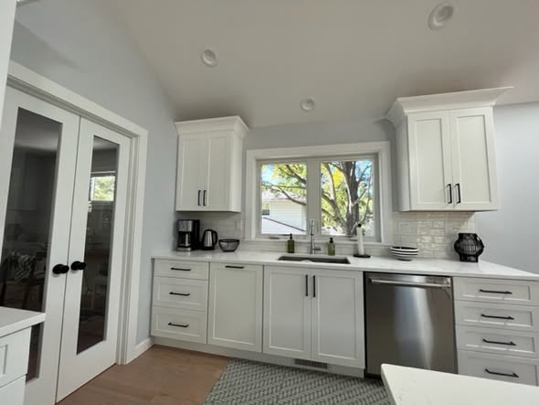 Premium White &amp; Black Kitchen Cabinetry System with Coordinated Bathroom Suite