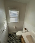 Warm Wood Bathroom Vanity with Subway Tile &amp  Mosaic Accents