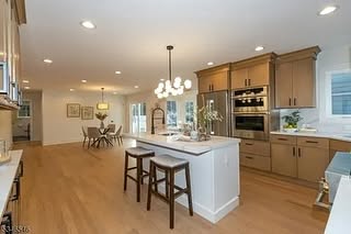Warm Wood &amp; White Island Kitchen Cabinetry - Luna Shaker Door Style